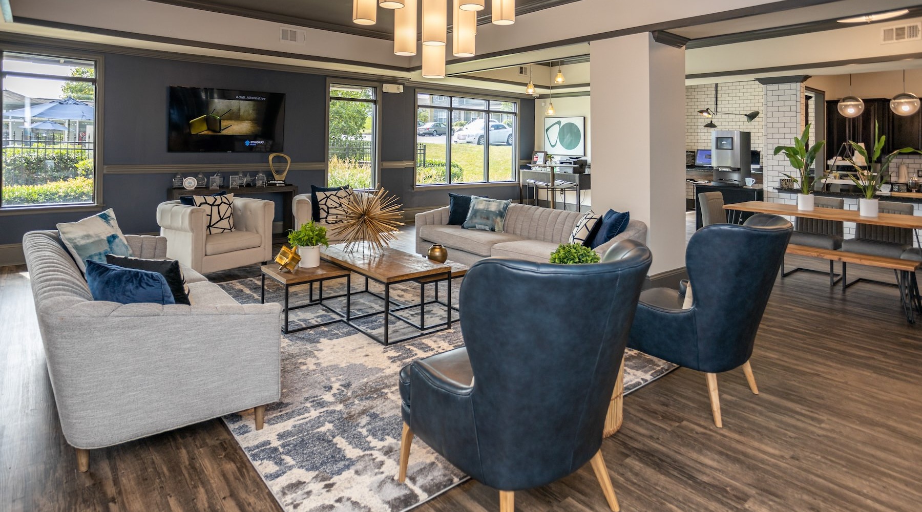 lounge with seating and a tv