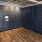 a room with dark mail cabinets